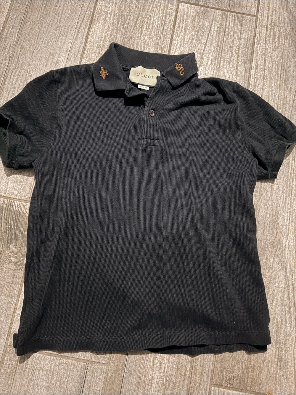 Gucci Black Polo with Gold Embroidered Collar Motifs